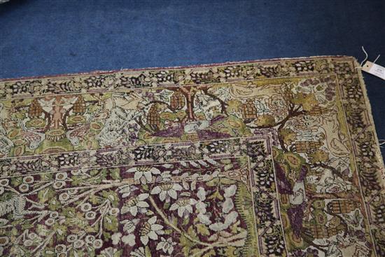 An antique Kirman? Tree of Life rug, 7ft 2in by 4ft 8in.